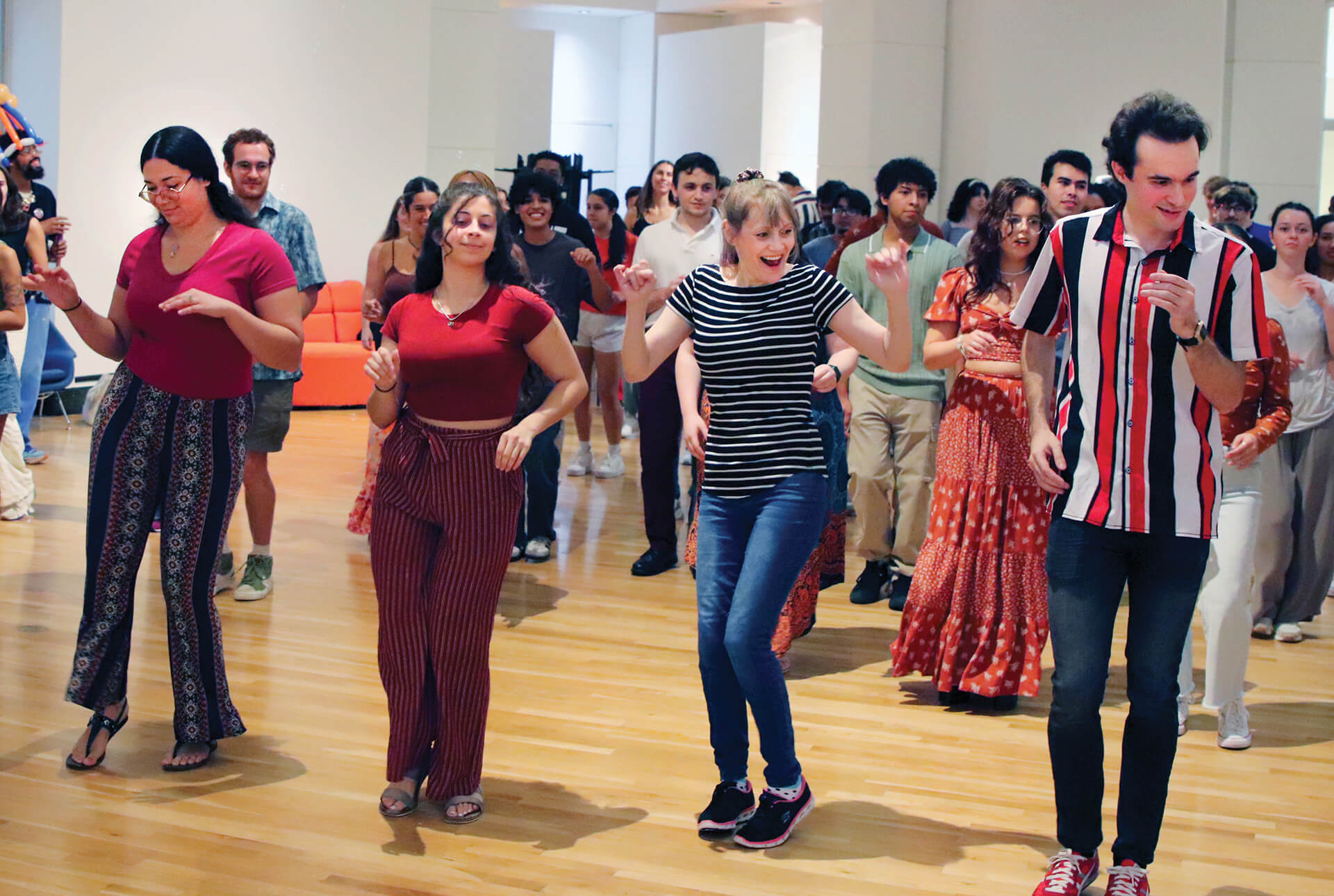Group of people performing Latin dance