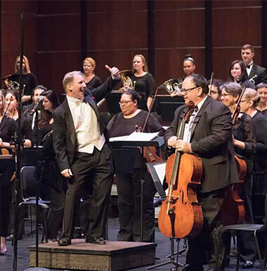 the gainesville orchestra with conductor evans haile