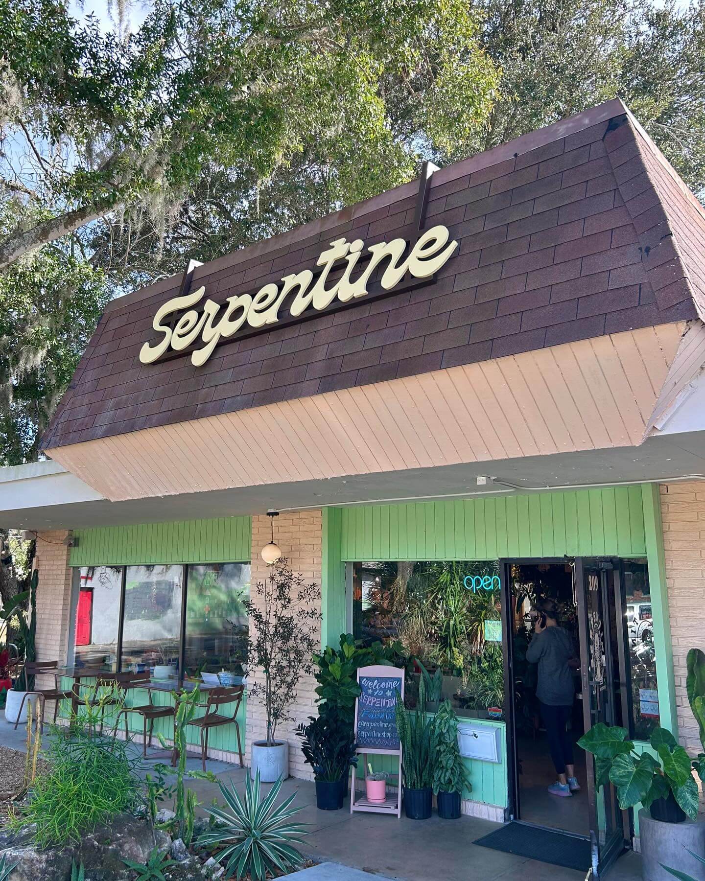 storefront of serpentine plants and provisions
