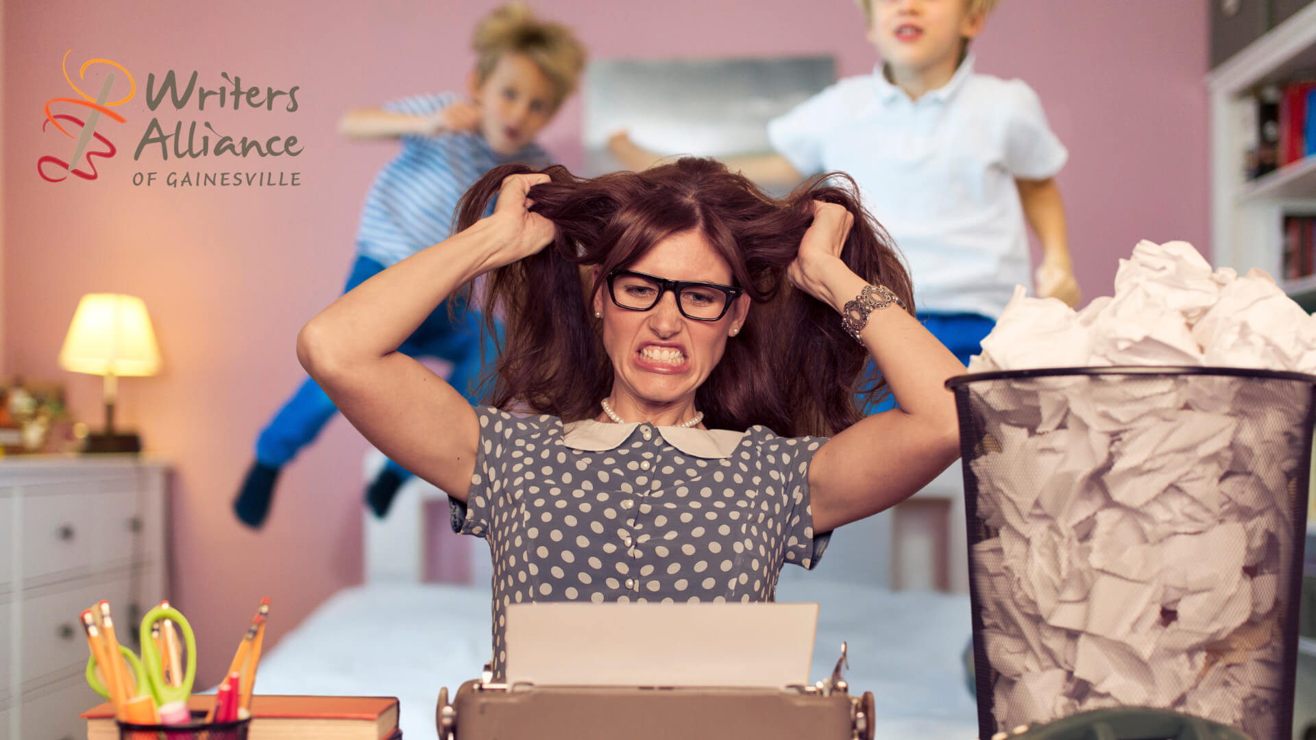 photo illustrating a woman trying to write while two children jump on the bed behind her